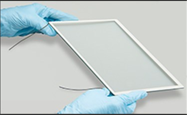 EMI shielding glass with integrated metal mesh